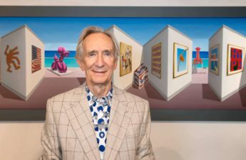 image of Patrick Hughes alongside one of his Reverspective paintings to drop as NFT