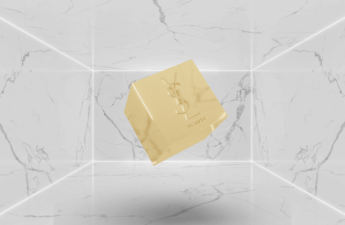 The picture shows a gold cube with YSL engraving suggesting Yves Saint Laurent Beauté's entry to the NFT space.